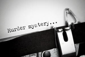 A black and white image of a typewriter that spells out the words "Murder mystery..." onto a piece of paper